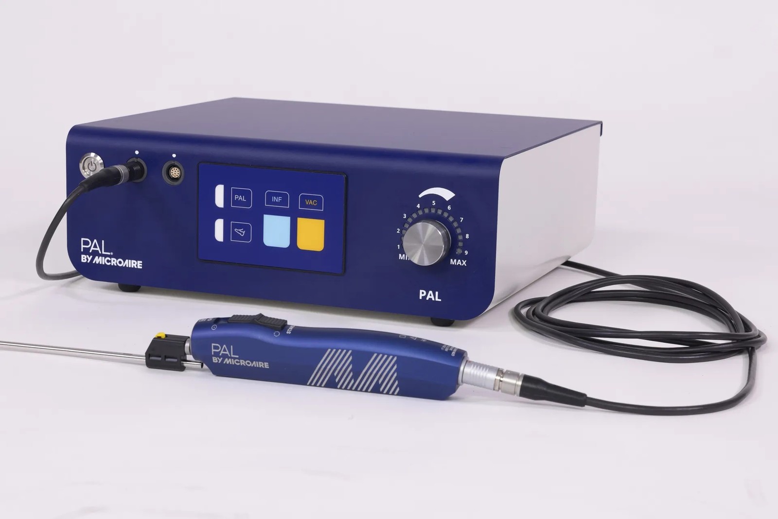 PAL device — a motorized handpiece connected to the main unit by a cable, with a cannula attached to the front of the handpiece