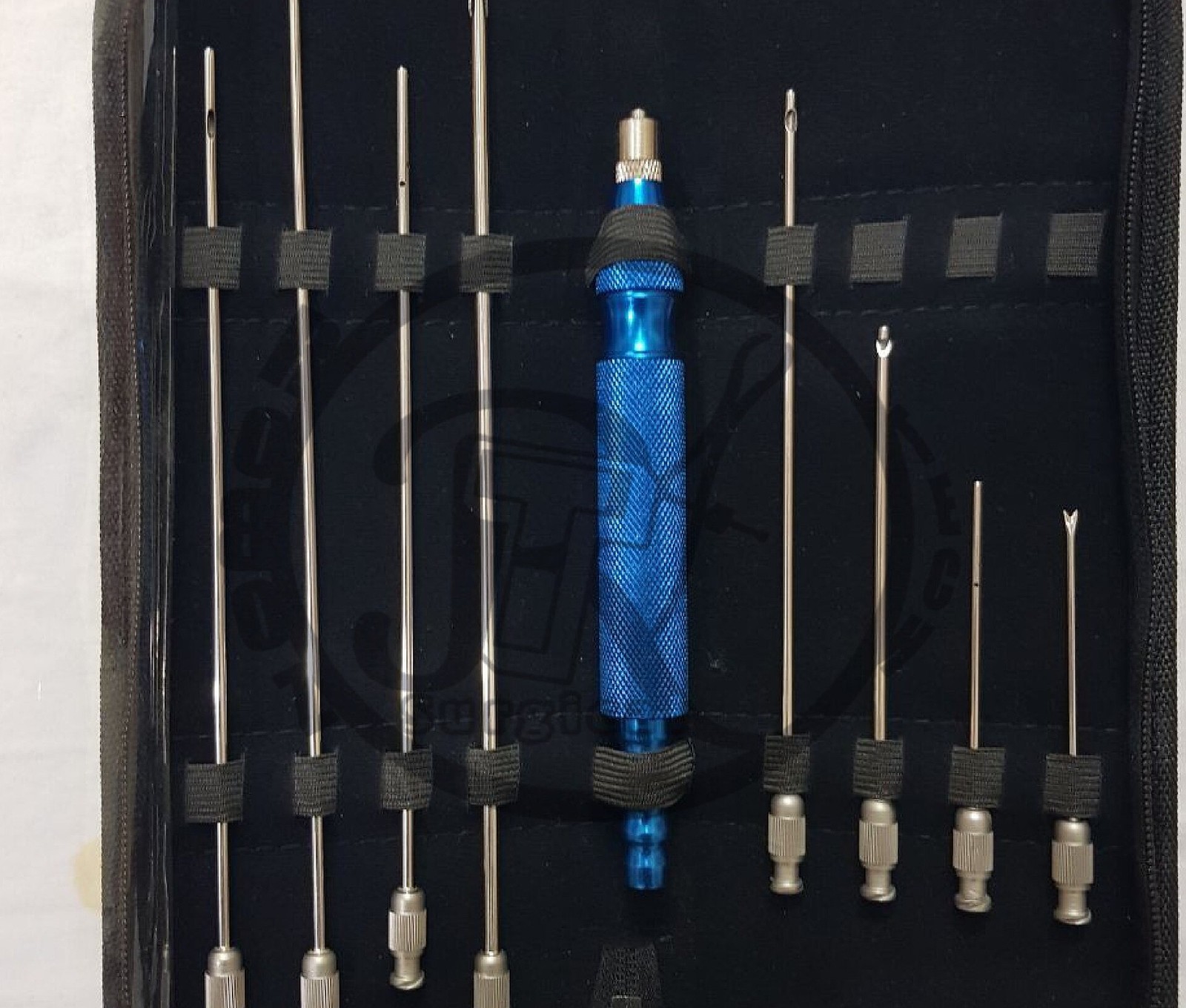 Various liposuction cannulas with different diameters and tip shapes, and a handle